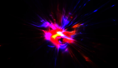 Light particles in motion, creating a burst of glowing multicolored rays on a black background. Energetic glow lights wallpaper.