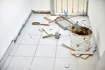 Professional ceramics tile tools for placing new tiles on the floor and wall.