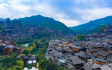 Naklejka premium Dusk scenery of Qianhu Miao village in Xijiang, Qiandongnan, Guizhou Province, China