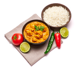 Traditional Chicken Curry and a bowl of boiled rice isolated on white background with clipping path embedded