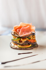 Veggies topped with Iberian ham