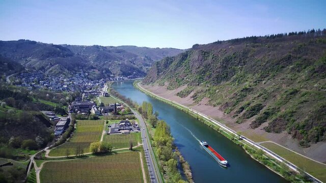 Drone footage over the river Mosel in Germany, ship travelling