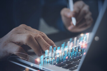 Businessman analysing market report, trading graph financial data. Business finance background