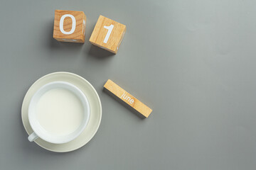 glass of milk on gray backgroud