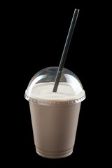 Milkshake with ice cream, juice and fruit syrup, closed glass, black background, isolate