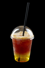 Summer Drink Fresh Lemonade in the plastic cup, black background, isolate