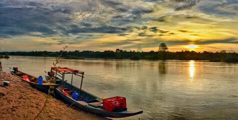 Wild Mekong riverside at sunset