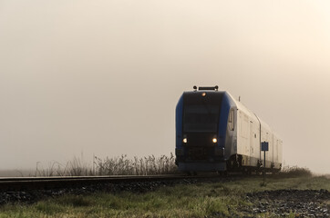 REGIONAL TRAIN - Passenger vehicle on a railroad 