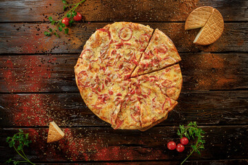 Pizza with cheese on a dark wooden background