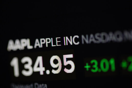 Shallow depth of field (selective focus) and macro image with Apple quotation on a digital screen.