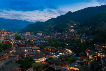 Fototapeta na wymiar Night view of Qianhu Miao village in Xijiang, Qiandongnan, Guizhou Province, China