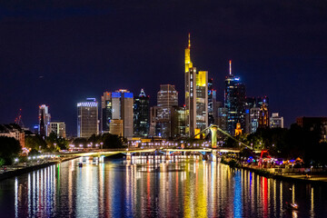 Fototapeta na wymiar FRANKFURT, GERMANY, 25 JULY 2020 Modern cityscape of the business district with reflection on the Main river at night