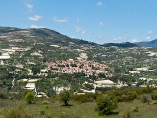 Fototapeta na wymiar View of mountains with village on the slope