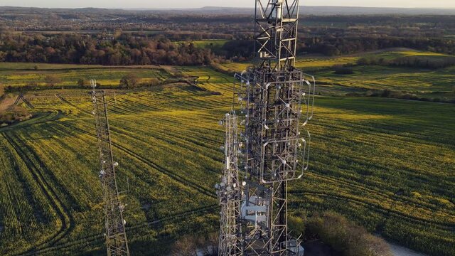 Aerial drone view of tower antennas Telecommunication cell phone, radio transmitters of cellular 5g 4g mobile and smartphones