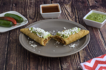 Picadillo quesadilla with guacamole, typical mexican food