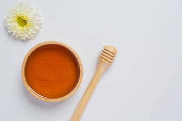 Delicious honey on white background