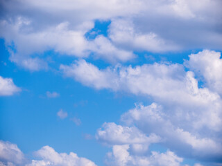 Naklejka na ściany i meble Cloud on blue sky background - zoom and details on clouds - free space to write - high resolution photo
