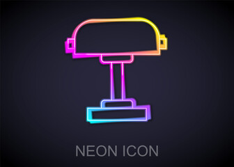 Glowing neon line Table lamp icon isolated on black background. Desk lamp. Vector