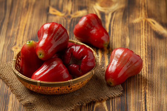 rose apple on dark wooden backgroud