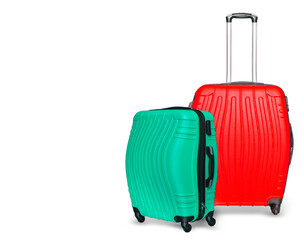 Colored suitcases on white background. Close up