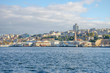 Fototapeta na wymiar Coast Istanbul Turkey with boats and old architecture 