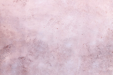 Pink background with beige and brown splashes. Space for text