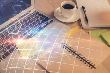 Double exposure of map drawing and desktop with coffee and items on table background. Concept of global data.