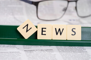 News on a newspaper page note