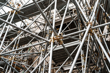 Scaffolding close-up on the background of the building