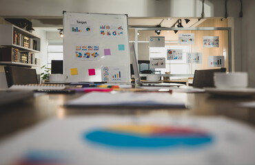 The meeting room provided for meetings has coffee cups, business papers, graphs and desks. Concept meeting room business.
