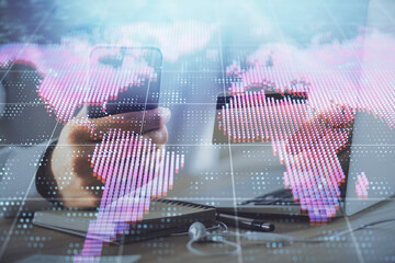 Double exposure of man hands holding a credit card and internet business theme drawing. Digital fintech and E-commerce concept.