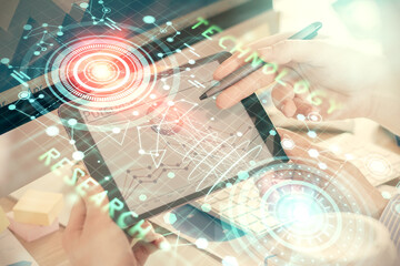 Multi exposure of man's hands holding and using a digital device and data theme drawing. Innovation concept.