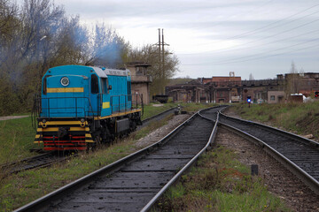 Fototapeta na wymiar diesel locomotive in industrial premises