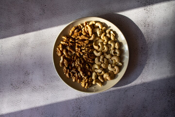 a plate filled with different types of nuts