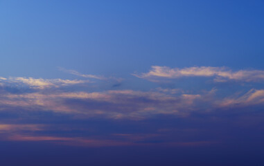 beautiful sunset sky, twilight, dark silhouette of clouds as a background