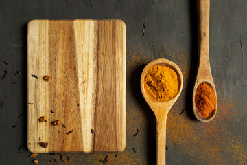 Black Background Wooden Spoon with Spices