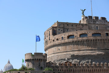 Monument called Castel Sant'Angelo in Rome and the European flag flying in the background you can...