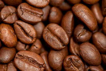 Coffee beans, close-up, top view. Dark background