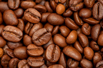Coffee beans, top view. Dark background