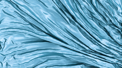 Blue silk. Beautifully laid fabric. Glamour horizontal background. High resolution.