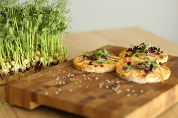Sandwich menu: ciabatta, avocado, fish, hummus and microgreen. Breakfast.