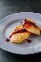 Pancakes with homemade strawberry jam. Beautiful photo for the restaurant menu