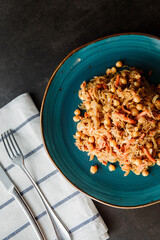 Stewed cabbage with chickpeas and carrots, lean vegetarian dish, healthy food, stewed vegetables