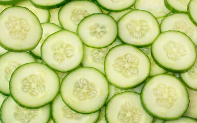 background of sliced ​​cucumbers. food background