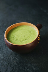 Spinach cream soup. healthy vegetarian lunch with protein