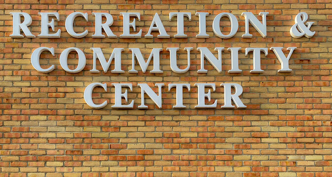 Recreation And Community Center Sign On Yellow Brick Building