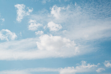 Blue sky and clouds on a sunny day, windy weather
