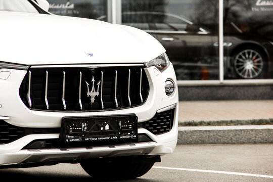 Kiev, Ukraine - April 21, 2020: A luxury Maserati Levante car parked in the city. Car for sale. Wallpaper