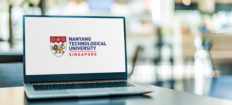 Laptop computer displaying logo of NTU
