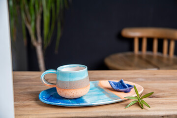 ceramic turkish coffee cups on wooden table
